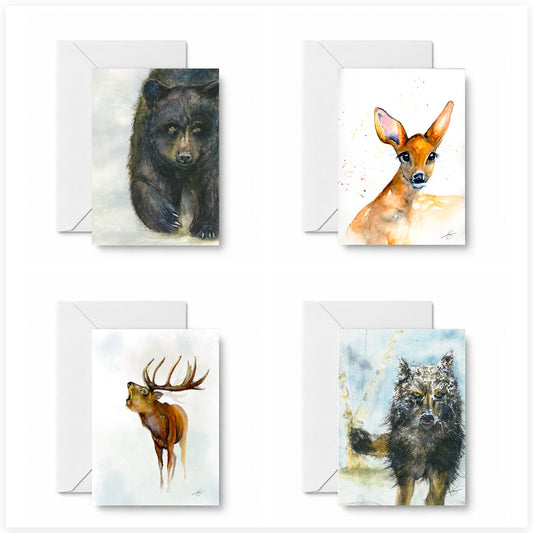 Northwoods Wild curated 4-card set featuring Black Bear, Spring Fawn, Elk in the Morning, and Wolf in snow